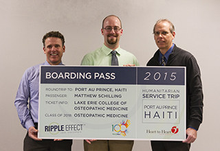 David Allyn, Matthew Schilling, and Steve Hower standing with winner of Ripple Effect Contest 