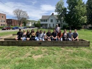 Dr. Munir Syed of LECOM Elmira Outside with class